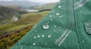 Close-up texture of the breathable, waterproof fabric used in a ladies hiking jacket.