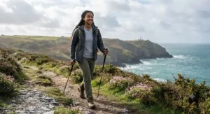 A person wearing a breathable softshell jacket while walking in variable weather